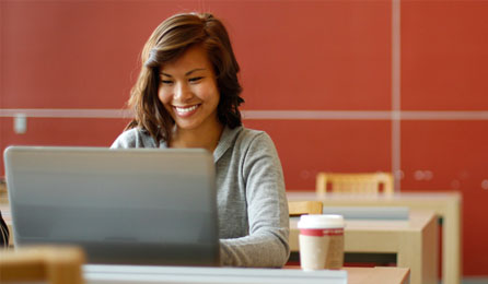 Asian student studying in library
