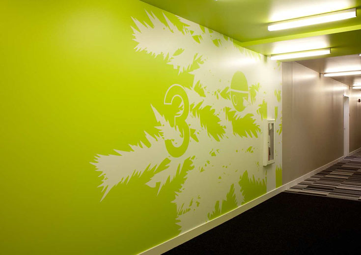 Green wall with art
