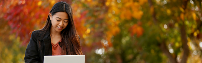 Student on Laptop in the Fall