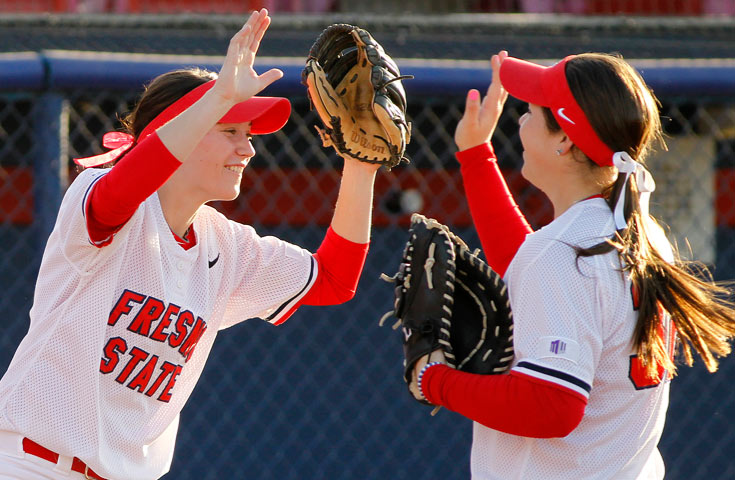 Girls playing baseball