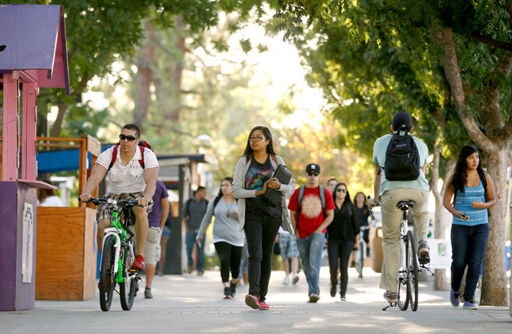 Students Walking and Biking on Campus