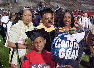 Dr. Robert Mikell Poses with Shauntel Kelso and Family