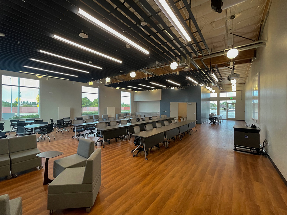 This is an interior image showing the Peters Business EMBA program classroom at Campus Pointe 100.