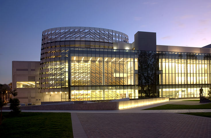 Night-time view of Fresno State Library from outside